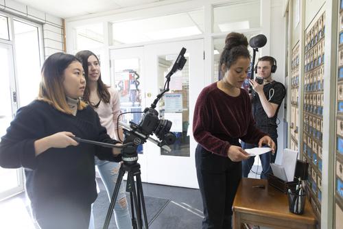 A group of TV/film students work together to film a scene for the Faultline Film Festival. 