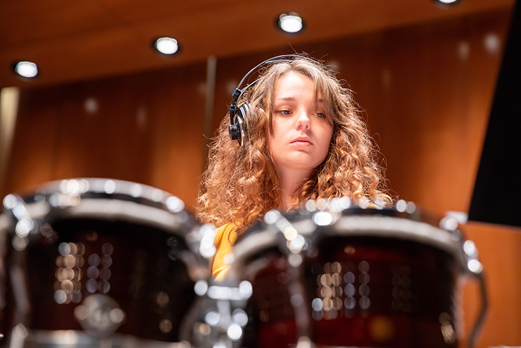 A student in the percussion ensemble playing for SEMO percussion ensemble at the River Campus