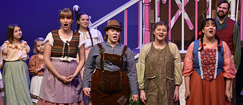 Students sing during opera theatre performance