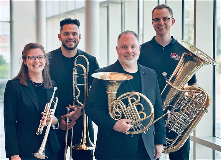 The Brass faculty of SEMO pose with their instruments for a professional photo