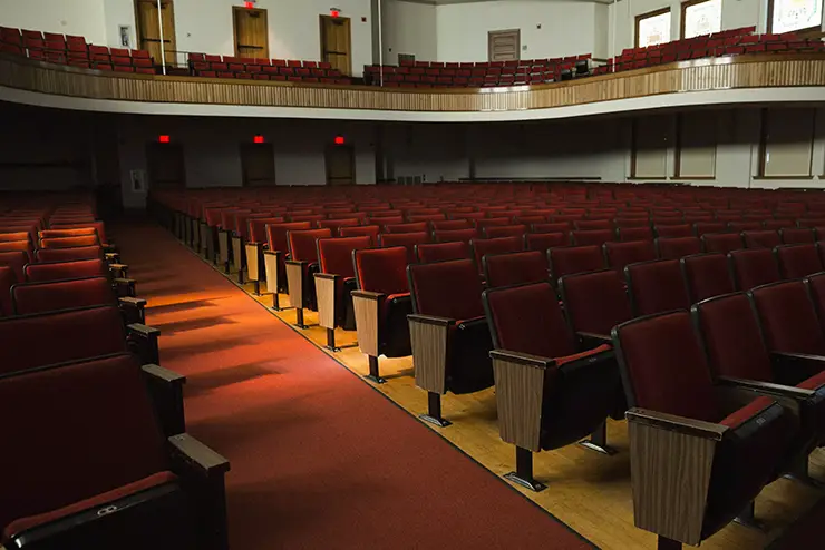 a wide view of the Academic Hall Auditorium room looking up through the seats