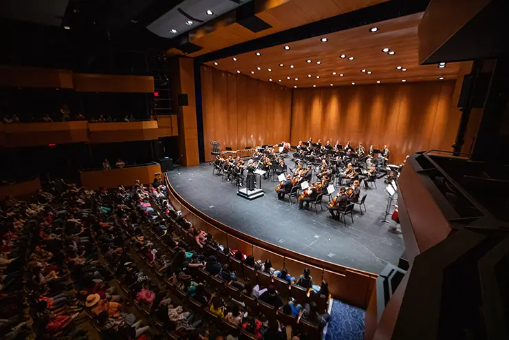 SEMO music students perform on stage in Bedell Hall for a full audience