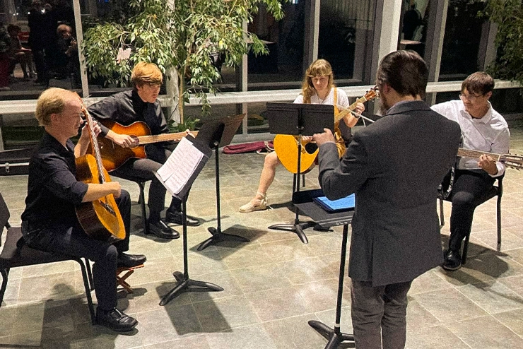 The guitar ensemble at SEMO at Felipe Brito teaches them in a small ensemble at River Campus. 