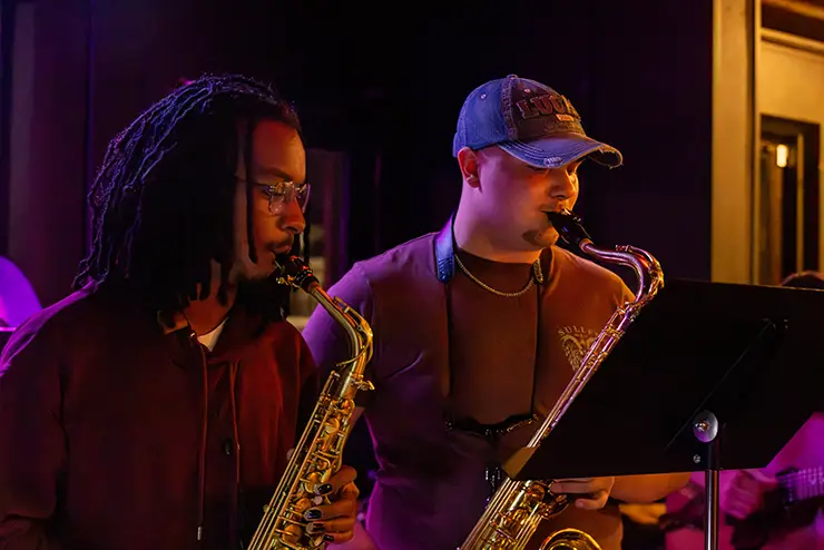 two SEMO music students perform at a venue for SEMO Jazz Band