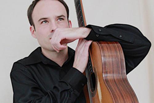 Patrick Rafferty poses with guitar