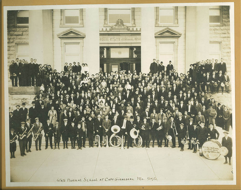 a black and white photo, yellowed with age, of the 1913 Normal school of music