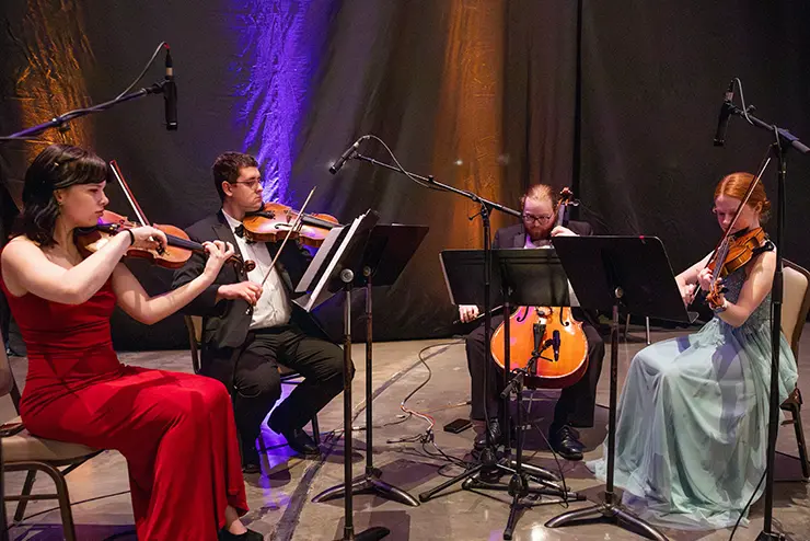 a quartet of SEMO string students perform together for the 150th ball