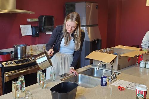 Students work on preparing SEMO Scents in a classroom