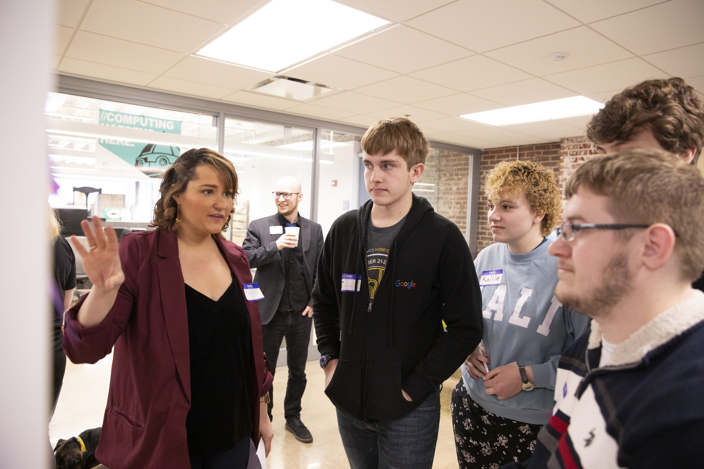 Students listen to an explanation at Catapult Creative House.