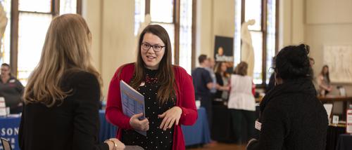 A student speaks with a hiring professional at a career fair hosted on Southeast’s campus.