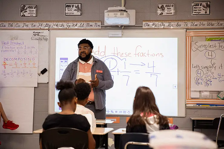 a SEMO education major teaches at the front of a classroom