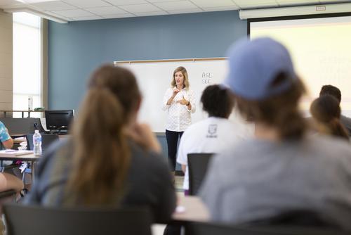  Students in class receive instruction from faculty member 