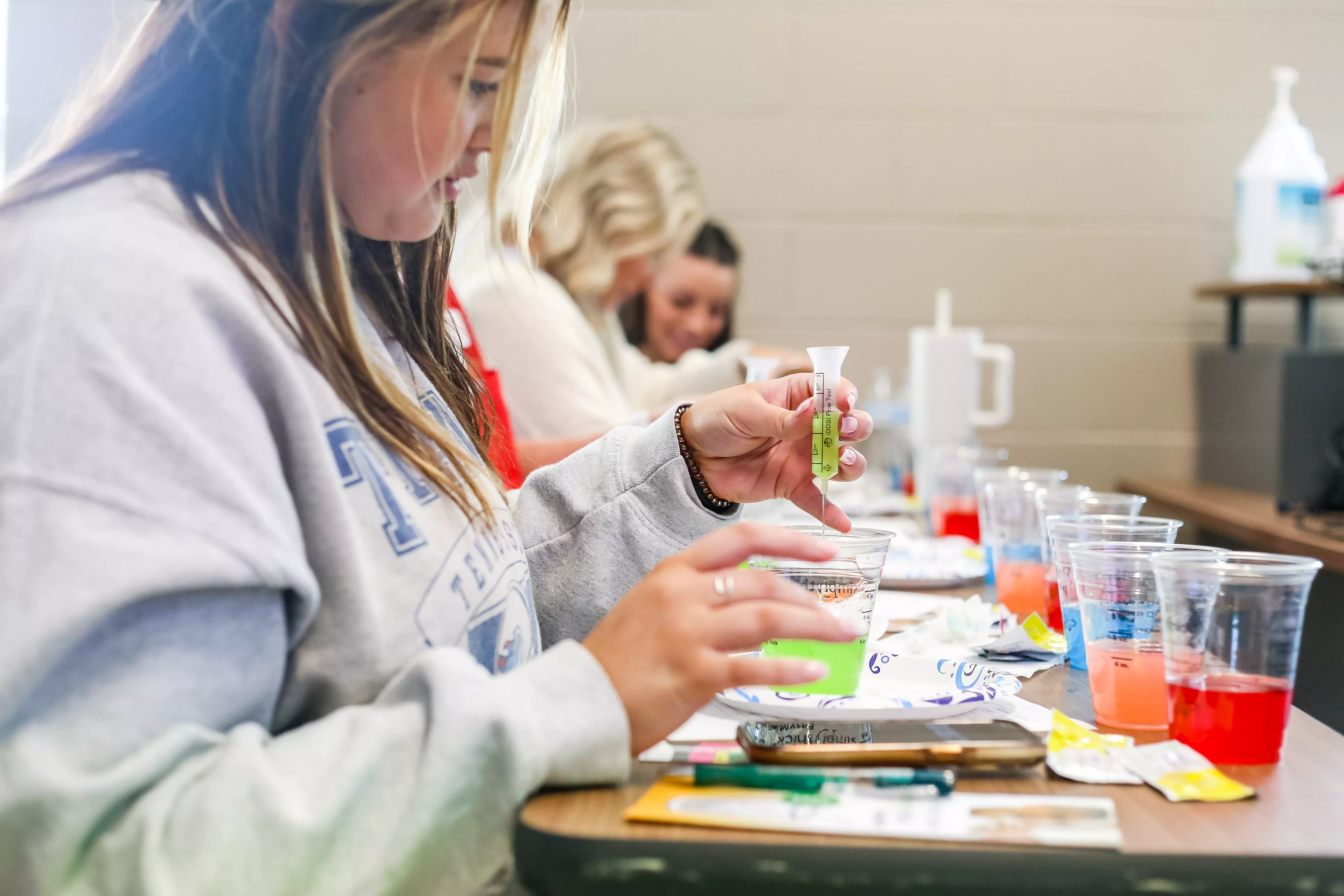 comms disorders student practicing their skills with the resources from the program so they can apply their education