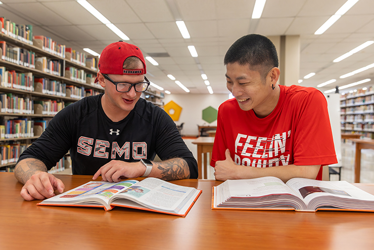  Students work in groups on an assignment 