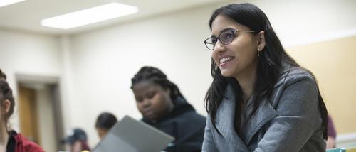 A group of Psychology students sitting at their desks in a classroom.