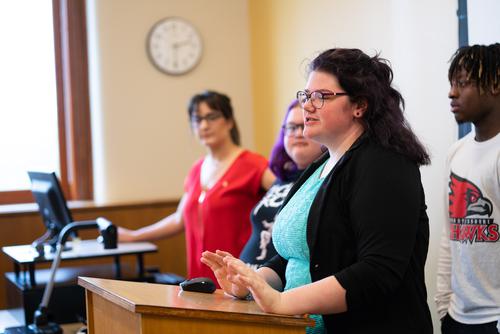 Students give a group presentation in a Communications Studies class.