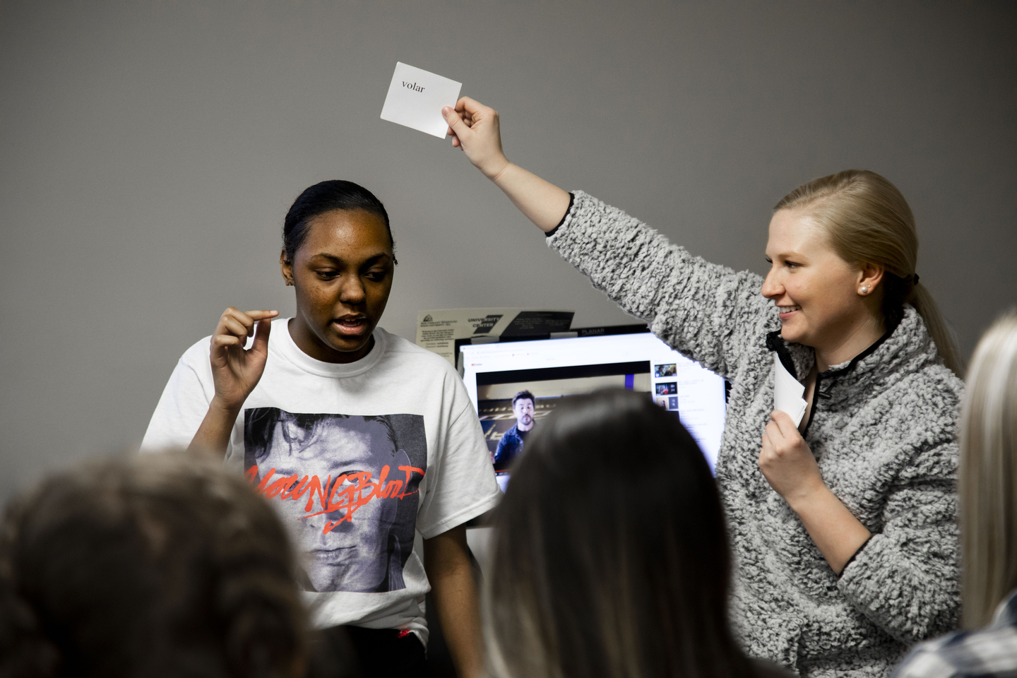 Students quiz each other on Spanish vocabulary in their Spanish Conversations class.