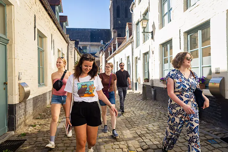 SEMO students walk in a group down a street in Belgium