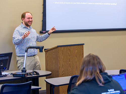 Professor teaches communication studies.