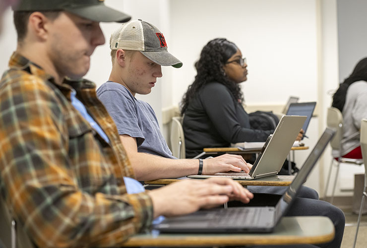 Group of Sociology Students working together on directed research which provides Experiential Learning in Sociology