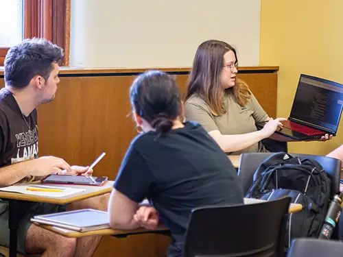 a group of english and communication majors sit together to talk through class work at semo a Missouri college known for job readiness