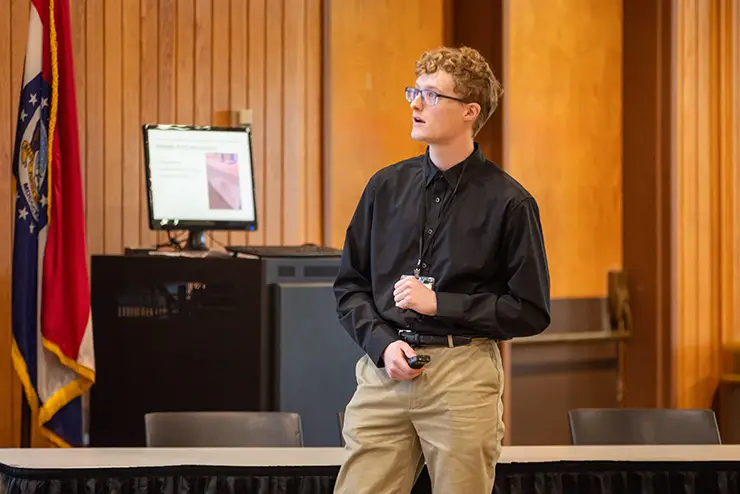 a student speaks in front of an audience during a presentation at semo a Missouri college known for job readiness