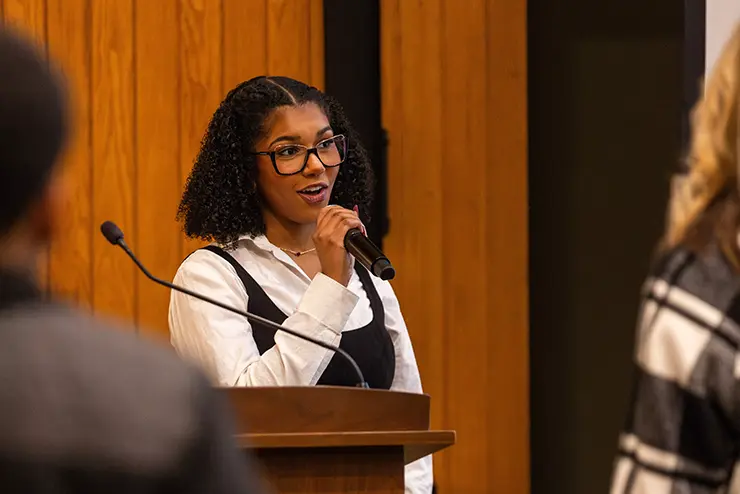 a student stands at a podium and delivers a speech at semo a Missouri college known for job readiness