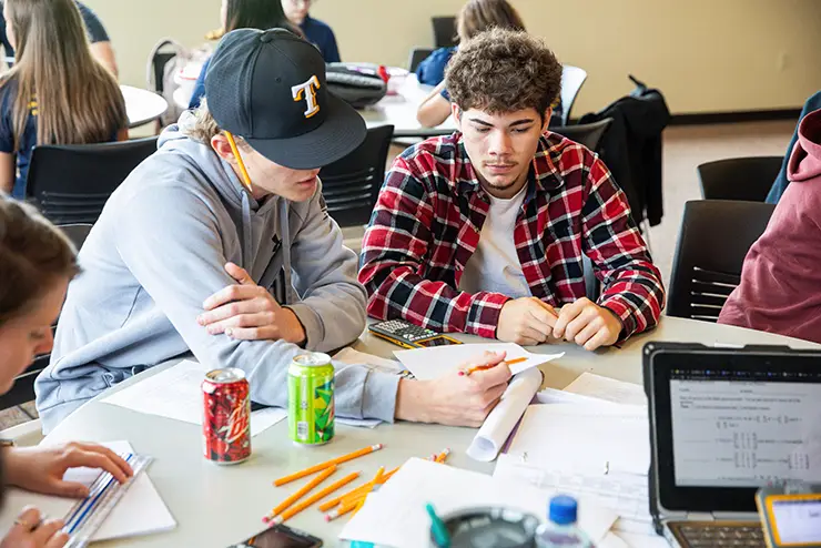 area high school students work on a math equation during Math Field Day