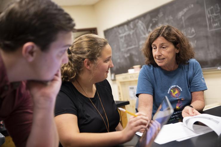 Southeast Missouri State University physics students receive faculty assistance in their lab.