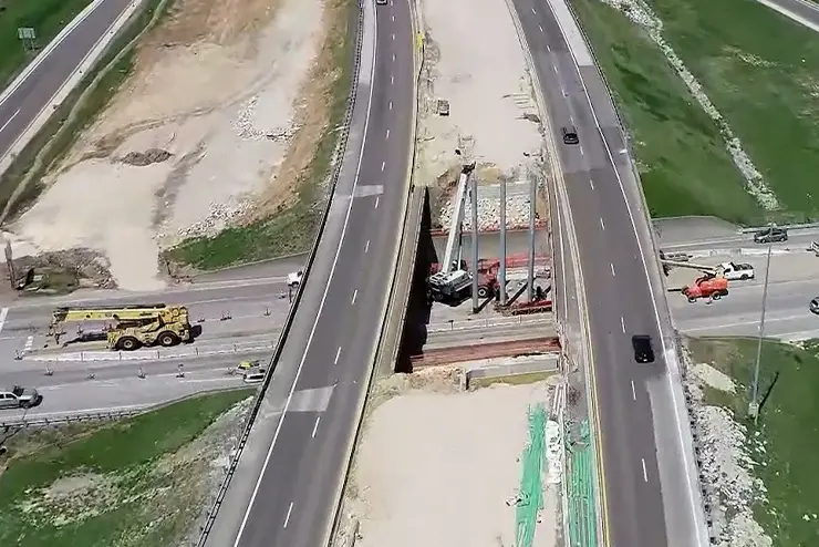 workers repave and work on part of an interstate road