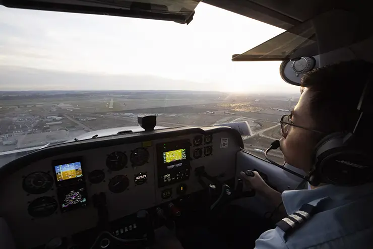 a SEMO professional pilot student sits in the copilot seat during a flight