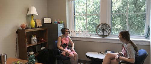 A Southeast student sits to talk with a Southeast counselor in Crisp Hall.
