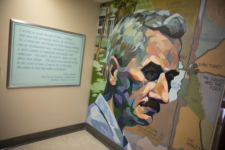The Faulkner Mural and a William Faulkner quote on walls in Kent Library.