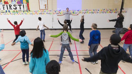 Sean Bard student teaching jumping jacks at Clippard Elementary.