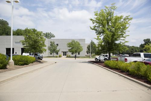 an exterior view of the facilities management building from the street