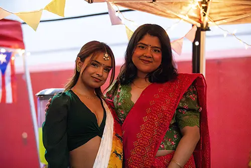two international students at SEMO pose together for a quick photograph during Carpe Diem