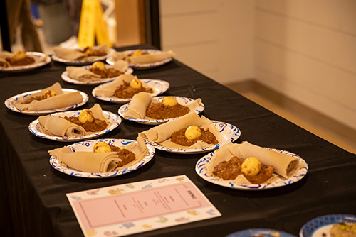 A table full of food for others to try.