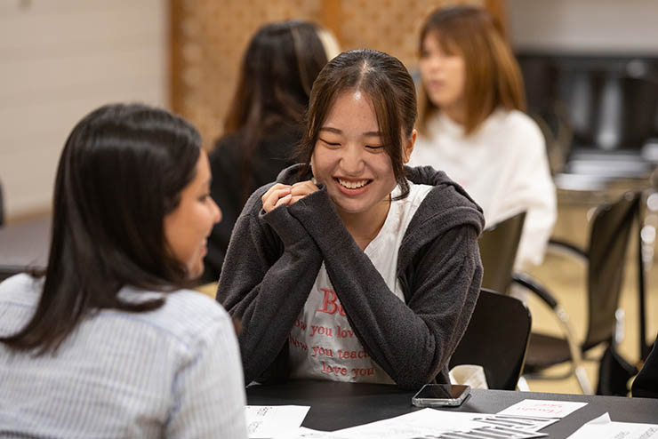 SEMO international students talk and laugh with each other