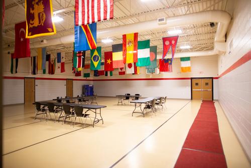 Students celebrate International Education Week outside of Academic