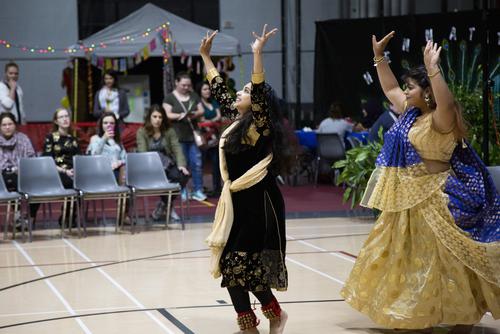 Southeast Missouri State University students dancing and enjoying a social event on a campus dance floor.