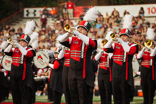 The band plays at the Family Weekend game.