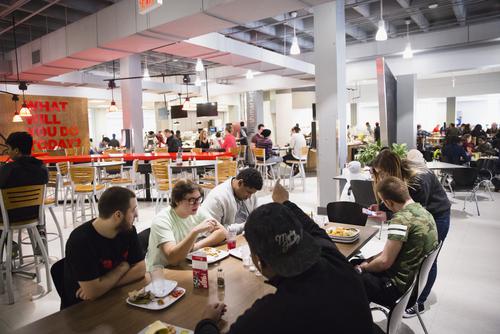 tudents eat inside a dining area of Towers Café. 