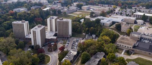 An aerial view of campus featuring the Towers Complex in autumn. 