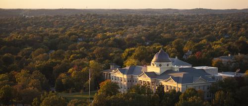 Aerial of Academic Hall at sunset.