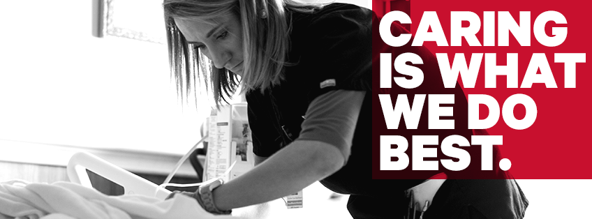 a nursing student performing patient care shot in black and white with the text "Caring is what we do best"
