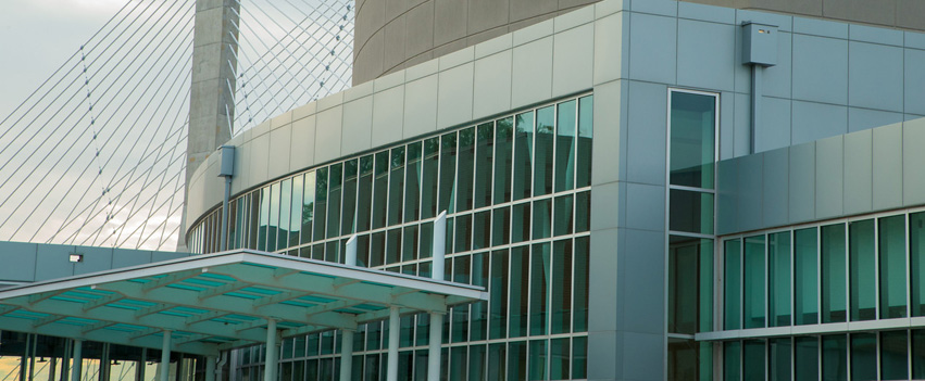 modern glass frontage of the River Campus Cultural Arts center