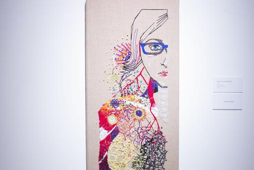 drawing of a woman among stylized flowers