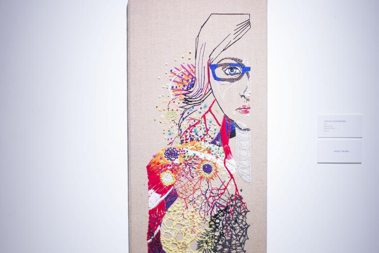 drawing of a woman among stylized flowers