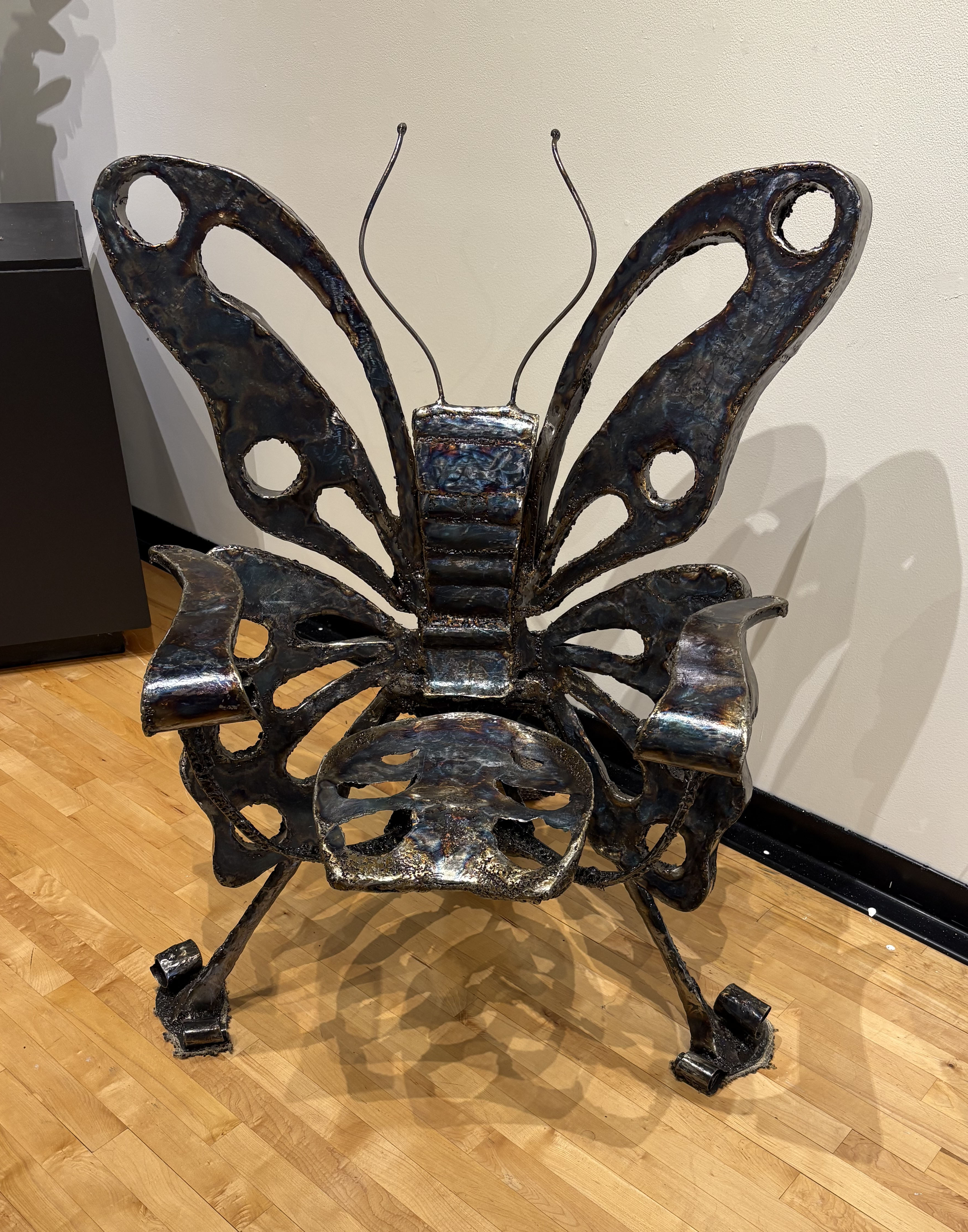 Sculpture of an iron butterfly.