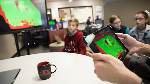 Image of local teachers and students in the EDvolution Center.